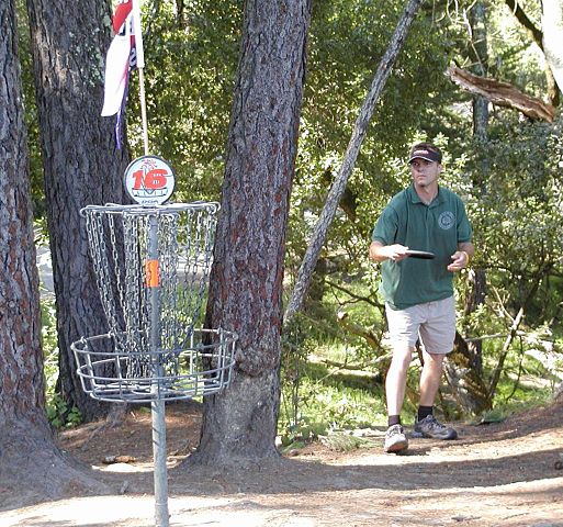 "Disc golfer and basket" by Steve Ganz - http://www.flickr.com/photos/steveganz/11559175/. Licensed under CC BY 2.0 via Wikimedia Commons - http://commons.wikimedia.org/wiki/File:Disc_golfer_and_basket.jpg#mediaviewer/File:Disc_golfer_and_basket.jpg